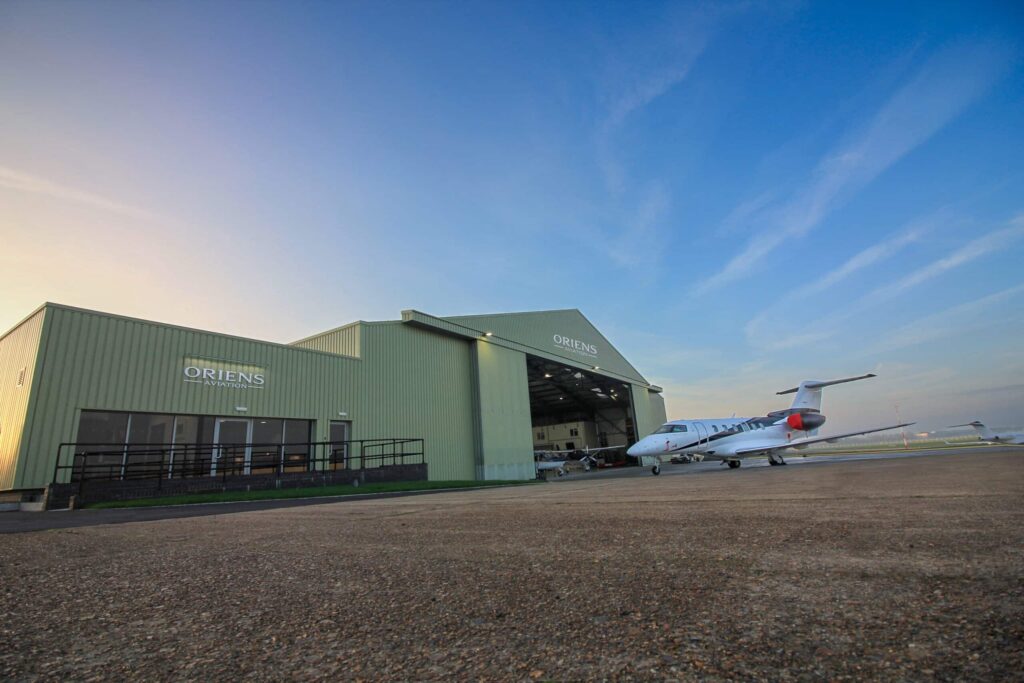Oriens Aviation Hangar at Biggin Hill Airport with a PC-24