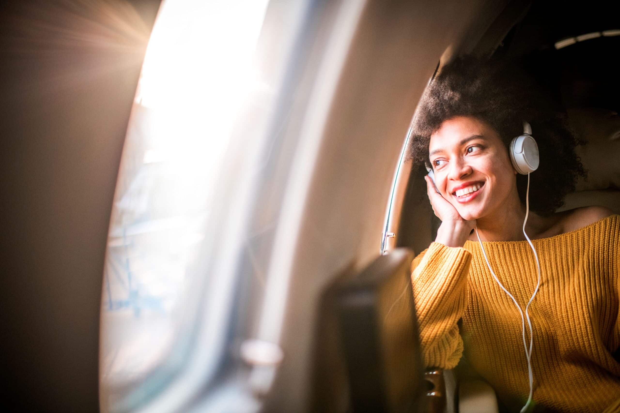 iStock-1187628180 - A Woman with Headphones - LR